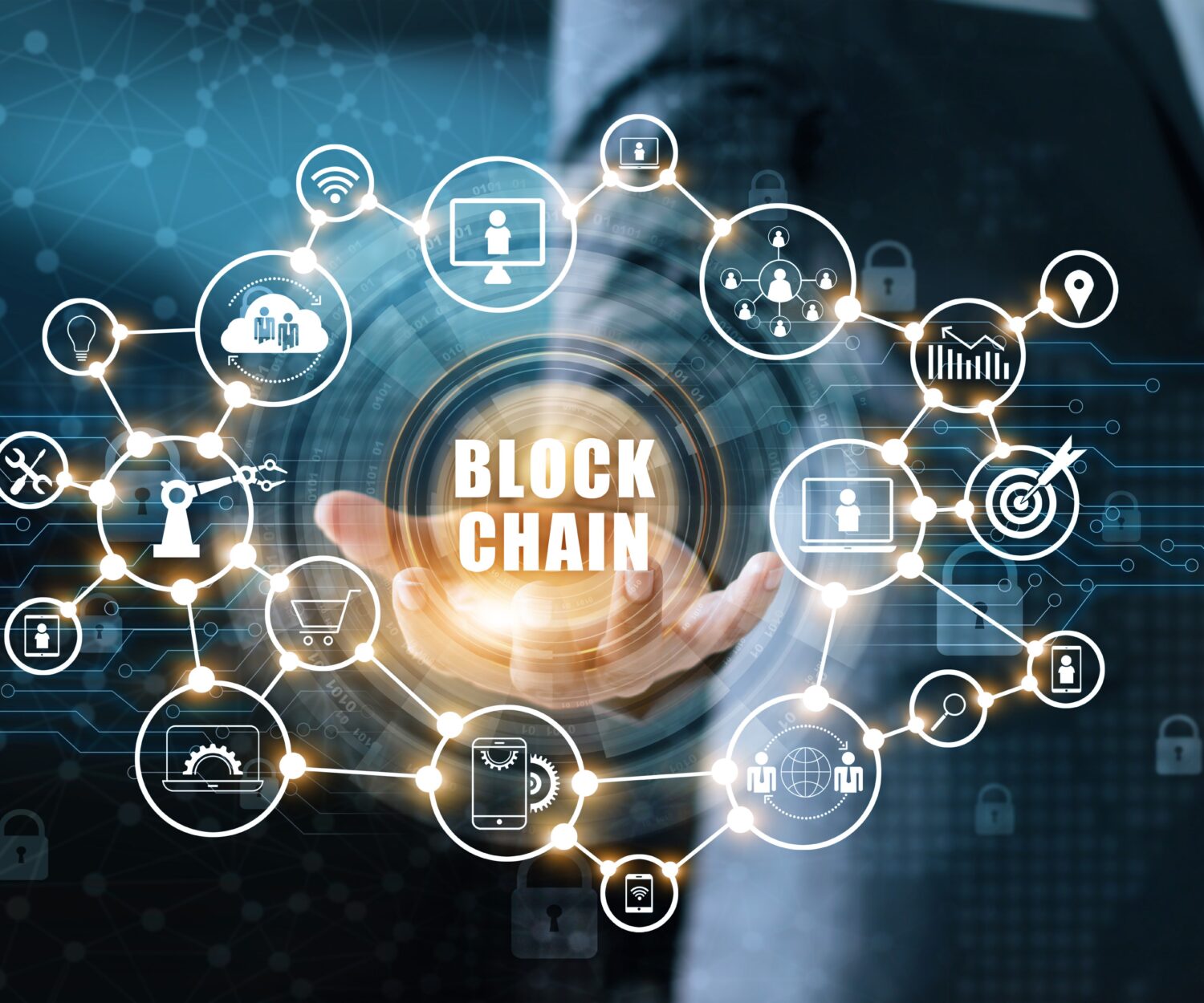 Blockchain technology and network concept. Businessman holding text blockchain in hand with icon network connection on blue security  and digital connection background
